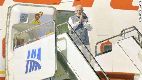 Indian Prime Minister Narendra Modi exits his plane after arriving in Wuhan in China&#39;s Hubei province on April 27.
