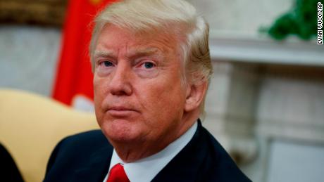 President Donald Trump listens to a question from a reporter during a meeting with Nigerian President Muhammadu Buhari in the Oval Office of the White House, Monday, April 30, 2018, in Washington. (AP/Evan Vucci)