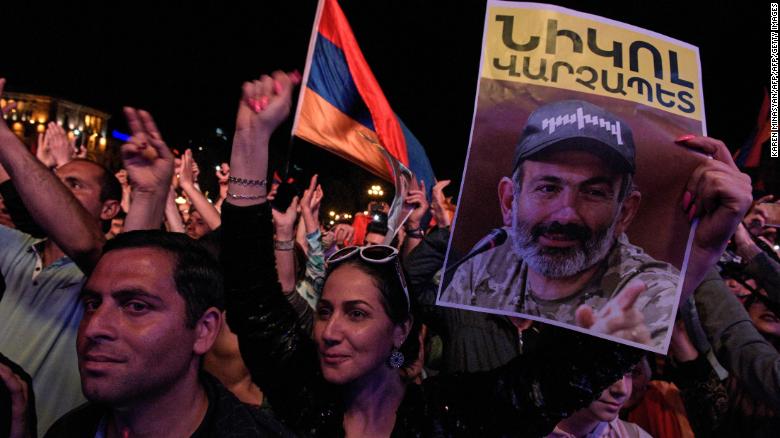 Supporters of Armenian opposition leader Nikol Pashinyan attend a rally in downtown Yerevan on Tuesday.
