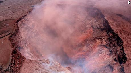 A plume of ash rises Thursday from the Puu Oo vent in this photo released by the US Geological Survey.