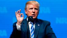 President Donald Trump gestures as he speaks at the National Rifle Association annual convention in Dallas, Friday, May 4, 2018. (AP Photo/Sue Ogrocki)