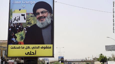 A portrait of Hezbollah leader Hassan Nasrallah is fixed on the side of a road in the mainly Shiite Muslim southern suburbs of Beirut. 