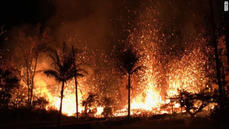 A lava fountain shoots up into the air in Hawaii.