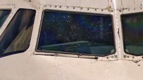 A JetBlue flight from San Juan to Tampa was diverted when the outer layer of the plane&#39;s windshield shattered.
