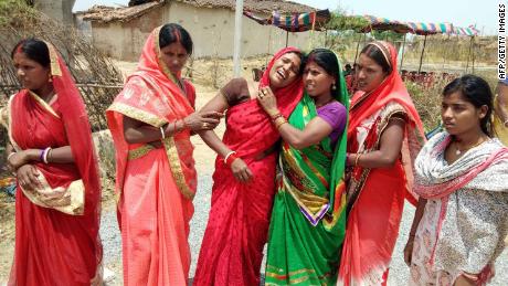 Indian relatives mourn following the rape and murder of a 16-year-old girl on May 3, at Raja Kundra Village in Chatra district of the eastern Indian state of Jharkhand.