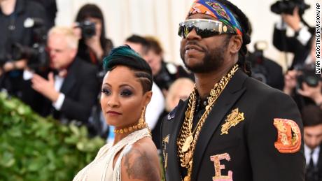 2 Chainz (right) and Kesha Ward walk the red carpet at the 2018 Met Gala in New York.