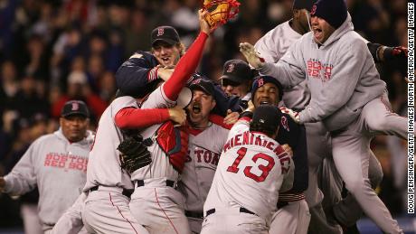 NEW YORK - OCTOBER 20:  The Boston Red Sox celebrate after defeating the New York Yankees 10-3 in game seven of the American League Championship Series on October 20, 2004 at Yankee Stadium in the Bronx borough of New York City. (Photo by Doug Pensinger/Getty Images)