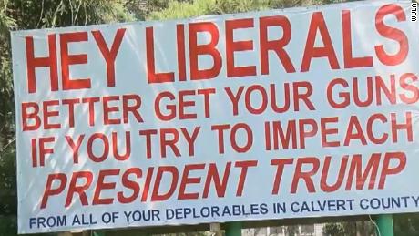 A sign in Maryland tells liberals to get their guns if they try to impeach Trump