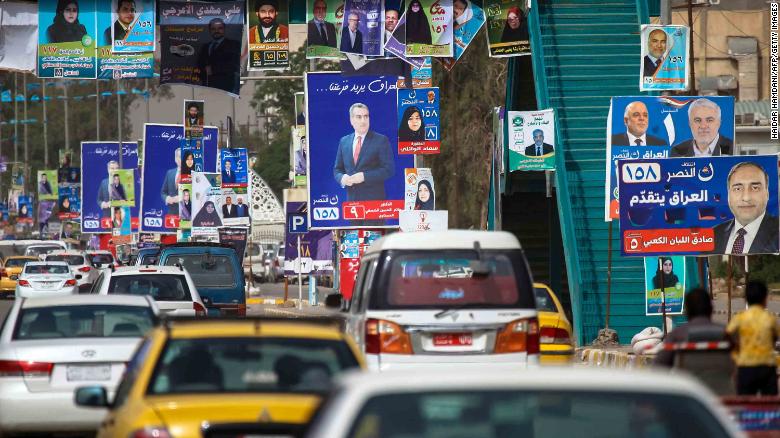 Electoral posters are displayed in Najaf on May 7, ahead of Iraq&#39;s parliamentary elections.
