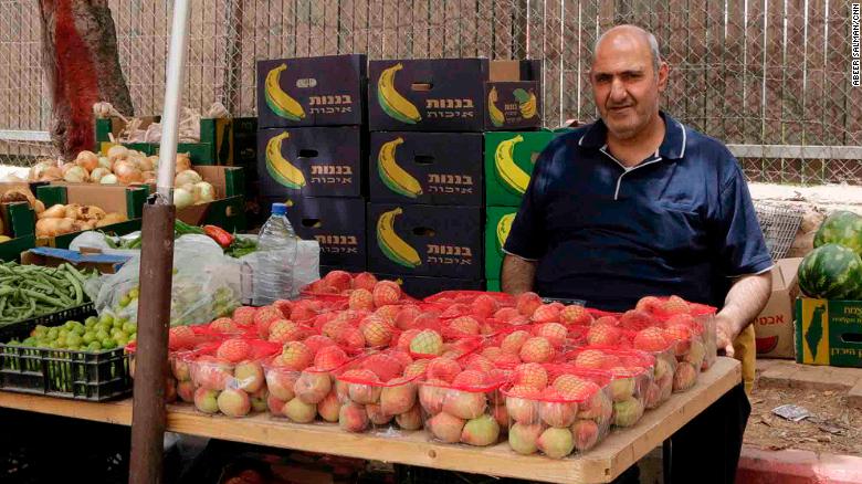 Khader Yousef, 53, works as a taxi driver and vegetable merchant at Bethlehem checkpoint.