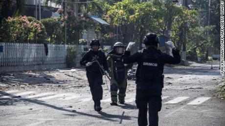 The Indonesian bomb squad at the scene of one of the attacks.