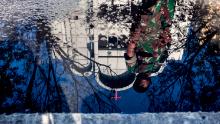 epaselect epa06734793 A reflection of an Indonesian soldier stands guard outside one of the churches that was hit by the bomb blast in Surabaya, East Java, East Java, Indonesia, 14 May 2018. According to media reports, at least four officers and six civilians were injured after an explosion following the deadly suicide bomb blasts that occurred at three churches that killed 13 in Surabaya.  EPA-EFE/FULLY HANDOKO