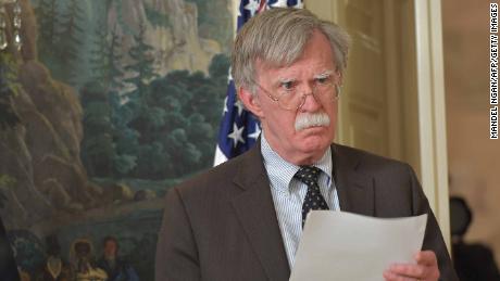 National Security Advisor John Bolton listens as US President Donald Trump addresses the nation on the situation in Syria April 13, 2018 at the White House in Washington, DC. Trump said strikes on Syria are under way.  / AFP PHOTO / Mandel NGAN        (Photo credit should read MANDEL NGAN/AFP/Getty Images)