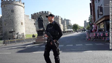 Armed police take position ahead of the dress rehearsal for the wedding on May 17.