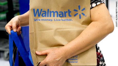 CHICAGO, IL - AUGUST 15: The Walmart logo is displayed on a shopping cart at a Walmart store on August 15, 2013 in Chicago, Illinois. Walmart, the world&#39;s largest retailer, reported a surprise decline in second-quarter same-store sales today. The retailer also cut its revenue and profit forecasts for the fiscal year.  (Photo by Scott Olson/Getty Images)