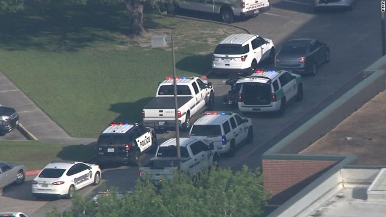 Authorities respond to a report of a shooting at Santa Fe High School Friday.