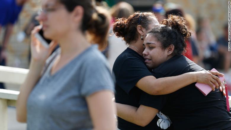 Santa Fe High School junior Guadalupe Sanchez, 16, cries in the arms of her mother, Elida Sanchez, after reuniting with her at a meeting point at a nearby fitness center after Friday&#39;s shooting.