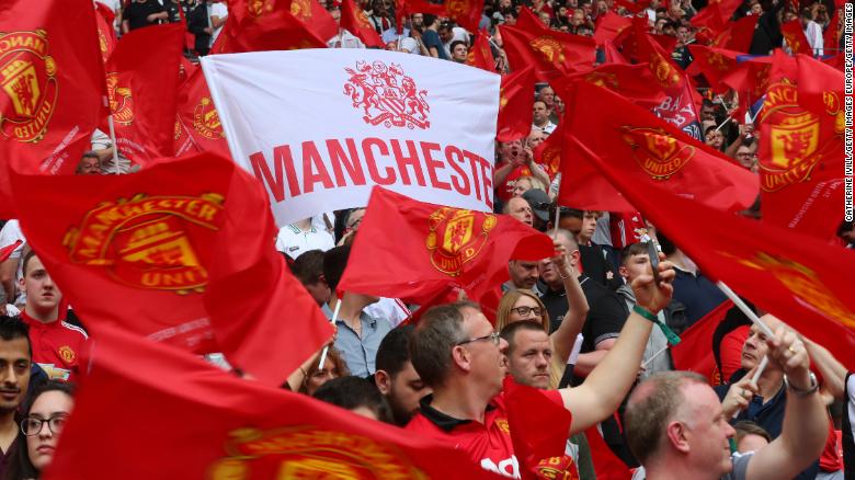 Manchester United fans cheer their team in the FA Cup semifinal.