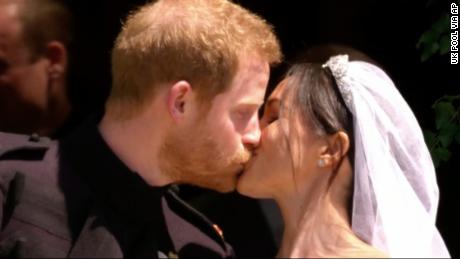 In this frame from video, Britain&#39;s Prince Harry and Meghan Markle kiss after their wedding ceremony at St. George&#39;s Chapel in Windsor Castle in Windsor, near London, England, Saturday, May 19, 2018.  (UK Pool via AP)