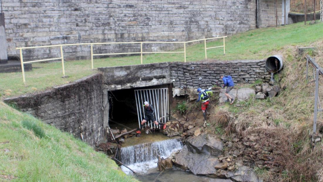 Barkley runners jump into a creek and wade through a tunnel that goes under Brushy Mountain State Penitentiary. It was the prison escape of James Earl Ray -- who assassinated Martin Luther King Jr. -- that helped inspire the race.