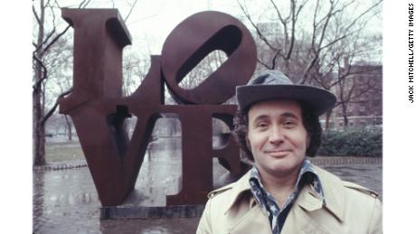 Robert Indiana with his &#39;LOVE&#39; sculpture in Central Park, New York City in 1971