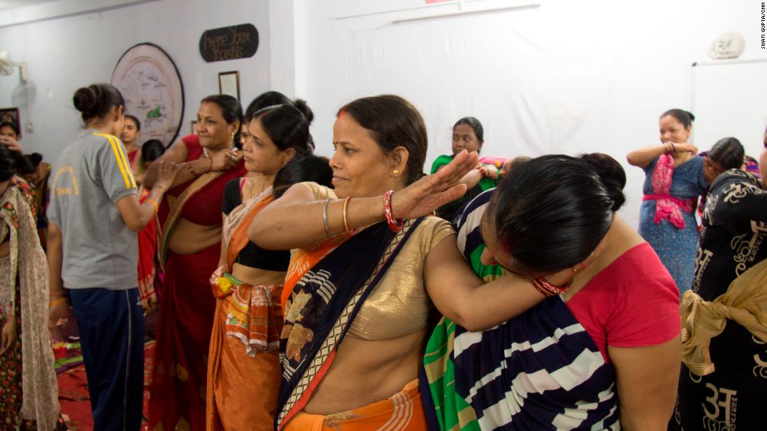 Women learn how to incapacitate an attacker in New Delhi, India.