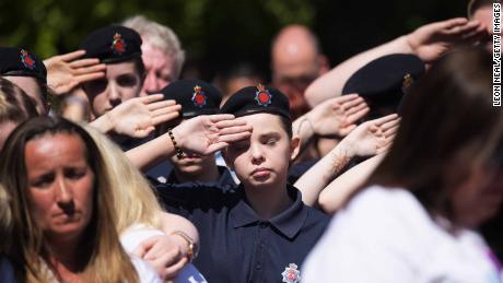 A cadet salutes during a minute&#39;s during the outside broadcast of the Manchester Arena commemoration.