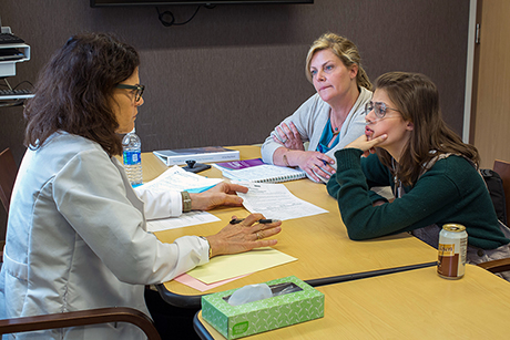 Leslie Fijolek, a social worker, asks Claire hard questions to see whether she's prepared to take on what a transplant would mean. 