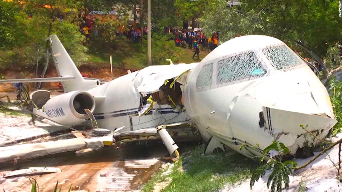 Jet splits in half in crash-landing - CNN Video