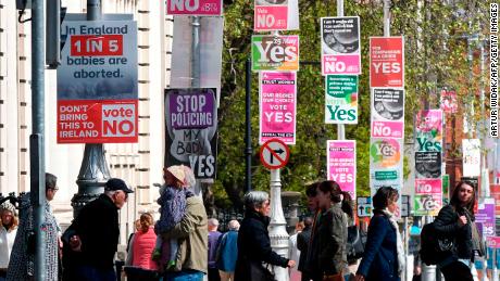 Posters for both campaigns on a lamppost in Dublin, Ireland.
