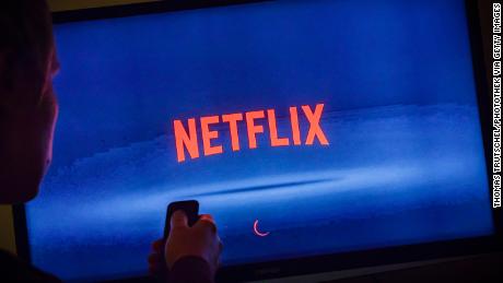 The logo of streaming service Netflix can be seen on a TV in Berlin, Germany, in this photo illustration.