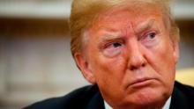 President Donald Trump listens during a meeting with Joshua Holt, who was recently released from a prison in Venezuela, in the Oval Office of the White House, Saturday, May 26, 2018, in Washington. (AP Photo/Alex Brandon)