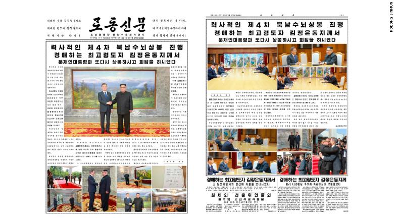 South Korean President Moon Jae-in and North Korean leader Kim Jong Un seen on the front page of the Rodong Sinmun after a surprise second meeting on May 26, 2018.