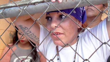 Roxana, photographed wearing a blue bandana, said she has retired from gang culture.