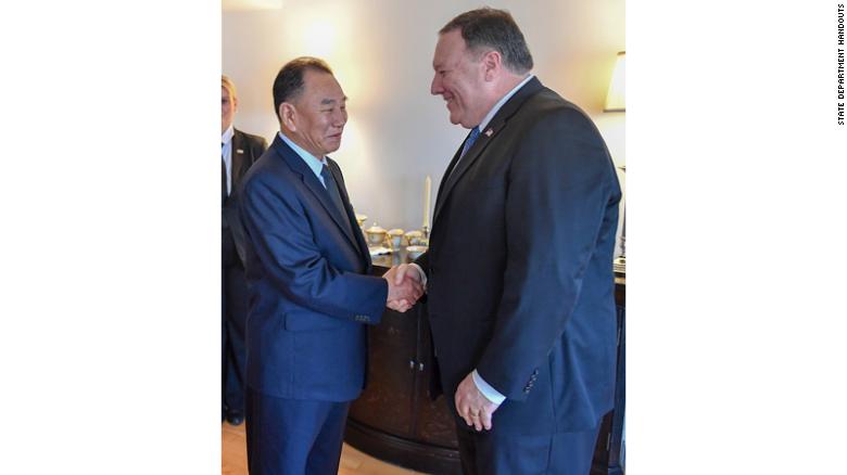 North Korean diplomat Kim Yong Chol shakes hands with US Secretary of State Mike Pompeo.