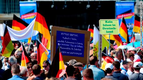 At an AfD rally on May 27,  supporters hold placards reading &quot;No Islam in Germany.&quot;