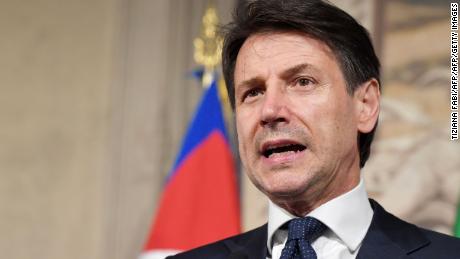 Italy&#39;s newly appointed Prime minister Giuseppe Conte announces the list of his government at the Quirinale presidential palace on May 31, 2018 in Rome after a meeting with Italian President. (Photo by Tiziana FABI / AFP)        (Photo credit should read TIZIANA FABI/AFP/Getty Images)