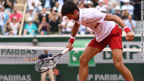 Novak Djokovic slammed his racket after losing a key point at the French Open Friday.  