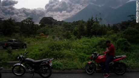 Volcan de Fuego, or Volcano of Fire, blows outs a thick cloud of ash, as seen from Alotenango, Guatemala, Sunday, June 3, 2018. One of Central America&#39;s most active volcanos erupted in fiery explosions of ash and molten rock Sunday, killing people and injuring many others while a towering cloud of smoke blanketed nearby villages in heavy ash. (AP Photo/Santiago Billy)