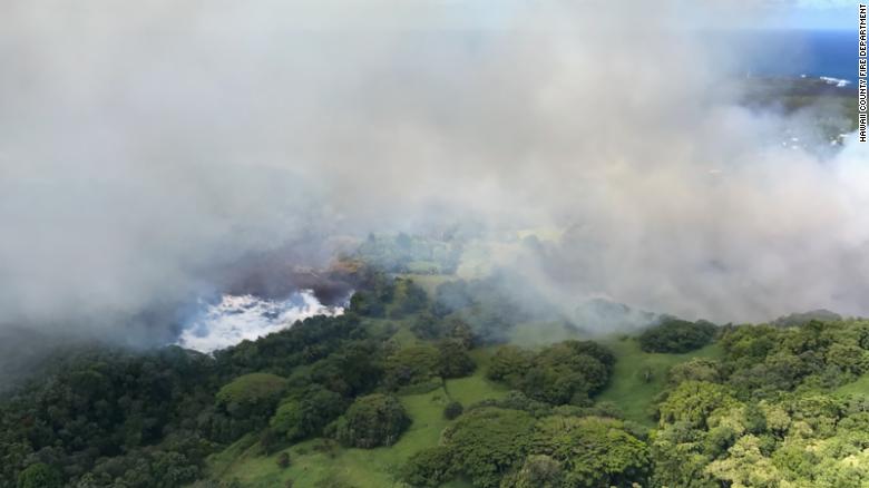 A Hawaii County Fire Department photo shows how lava flows evaporated the waters of Green Lake.