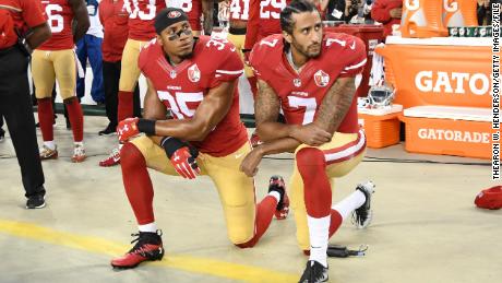 SANTA CLARA, CA - SEPTEMBER 12:  Colin Kaepernick #7 and Eric Reid #35 of the San Francisco 49ers kneel in protest during the national anthem prior to playing the Los Angeles Rams in their NFL game at Levi&#39;s Stadium on September 12, 2016 in Santa Clara, California.  (Photo by Thearon W. Henderson/Getty Images)