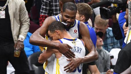 CLEVELAND, OH - JUNE 08:  Kevin Durant #35 of the Golden State Warriors hugs Stephen Curry #30 against the Cleveland Cavaliers during Game Four of the 2018 NBA Finals at Quicken Loans Arena on June 8, 2018 in Cleveland, Ohio. NOTE TO USER: User expressly acknowledges and agrees that, by downloading and or using this photograph, User is consenting to the terms and conditions of the Getty Images License Agreement.  (Photo by Jason Miller/Getty Images)