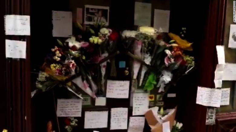 Fans leave flowers at Bourdain's old restaurant