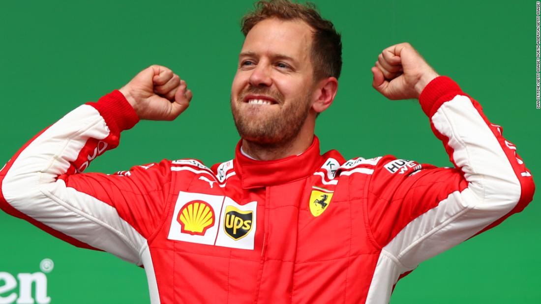 Sebastian Vettel&#39;s 50th career victory saw him replace Lewis Hamilton at the top of the championship standings to cap an emotional day for the Ferrari team.  