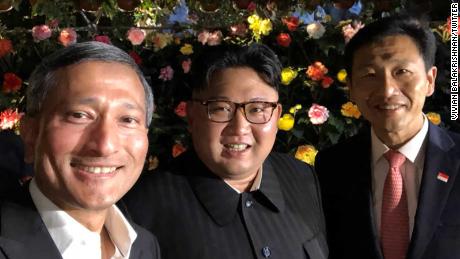 Singapore&#39;s Minister for Foreign Affairs Vivian Balakrishnan shared this photo of himself with North Korean leader Kim Jong Un, center, and Ong Ye Kung, Singapore&#39;s Minister for Education. The tweet reads, &quot;#Jalanjalan #guesswhwere?&quot;  &quot;Jalan-jalan&quot; means &quot;taking a walk&quot; in Malay.