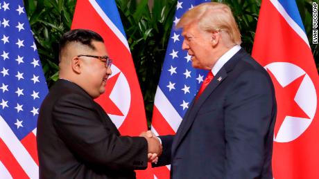 See historic handshake between Trump and Kim