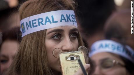 A supporter listens to Aksener speaking at a rally in Gaziantep, Turkey.