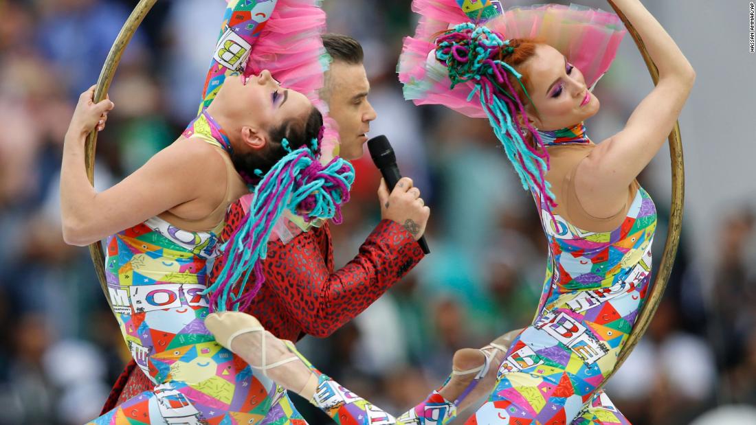 British pop star Robbie Williams headlined the opening ceremony.