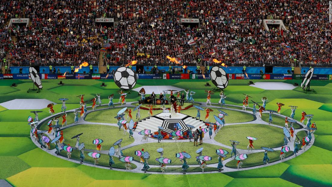 Performers take part in the tournament&#39;s opening ceremony.