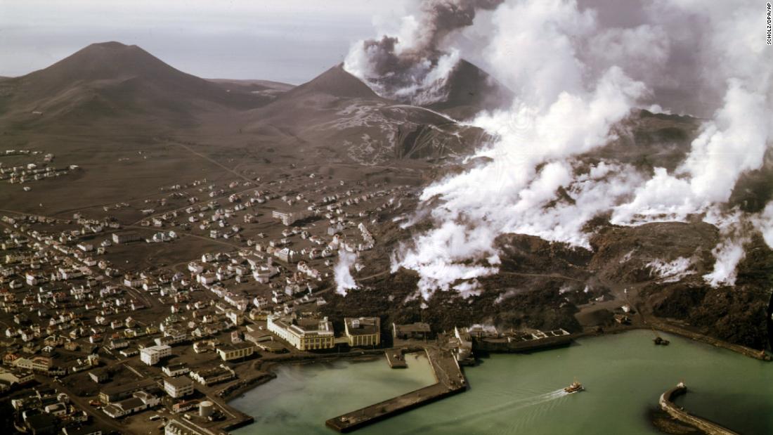 Black ashes cover the town of Vestmannaeyjar on the island of Heimaey after the eruption of the Eldfell volcano in 1973.